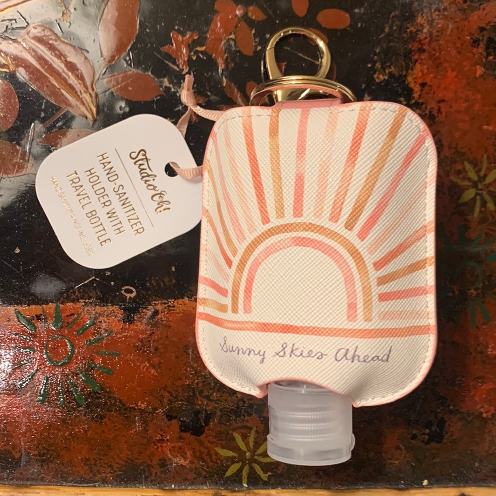 Hand Sanitizer with travel bottle and keychain!  Never used!